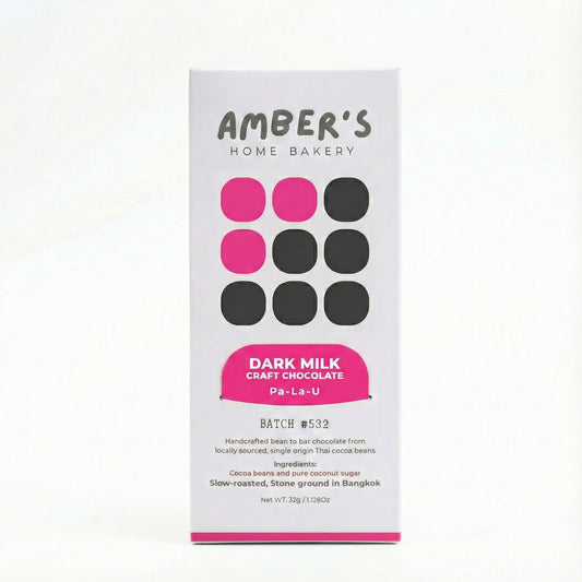 Amber's Home Bakery dark milk craft chocolate bar packaging on a white background