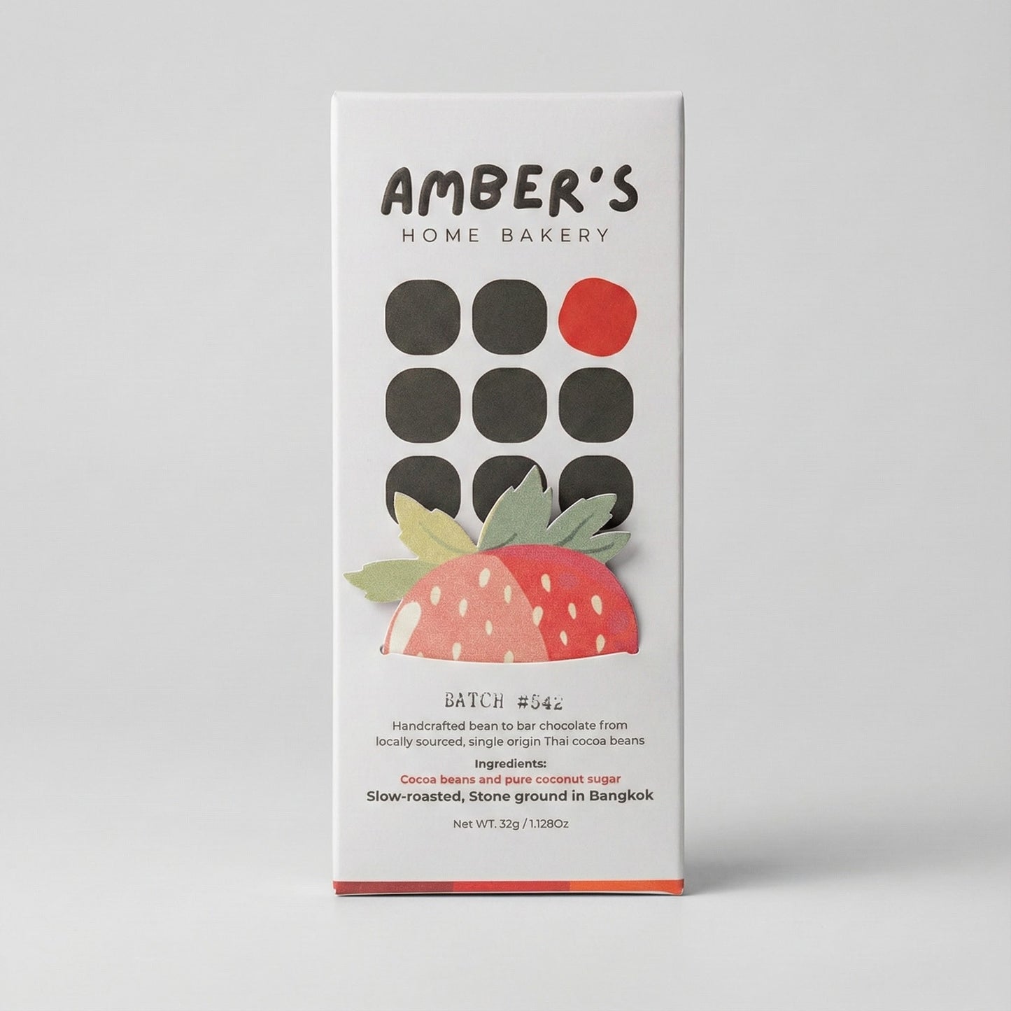 Chocolate bar packaging with 'Amber's Home Bakery' branding on a gray background